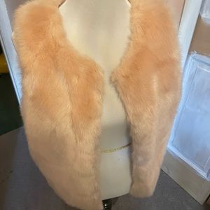Pale pink faux fur vest